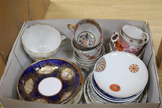 A quantity of assorted cups and saucers